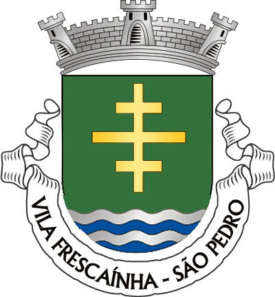 Escudo de verde, cruz papal de ouro; contra-chefe ondado de prata e azul, coroa mural de prata de três torres. Listel  branco, com a legenda a negro: «VILA FRESCAÍNHA - SÃO PEDRO». 