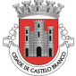 Escudo de vermelho, com um castelo de prata aberto e iluminado de negro. Coroa mural de prata de cinco torres. Listel branco, com a legenda a negro : " CIDADE DE CASTELO BRANCO ".  